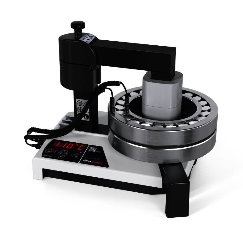 simatherm IH 125 induction heater with bearing clamped on the heating ring and digital display